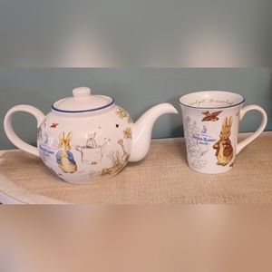 Beatrix Potter Peter Rabbit matching teapot and cup set.